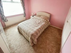 Bedroom One- click for photo gallery